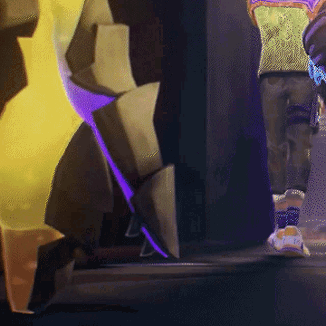 a video game character is standing in front of a purple and yellow item