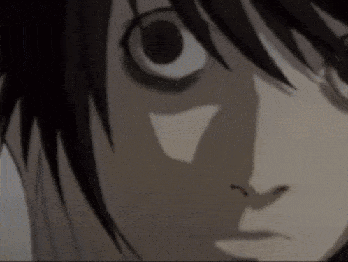 a close up of a person 's face with a very large eye