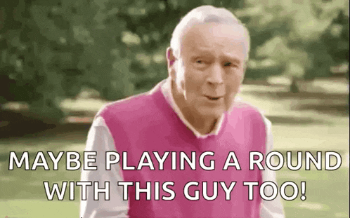 an elderly man in a pink sweater is playing a round of golf with a guy .