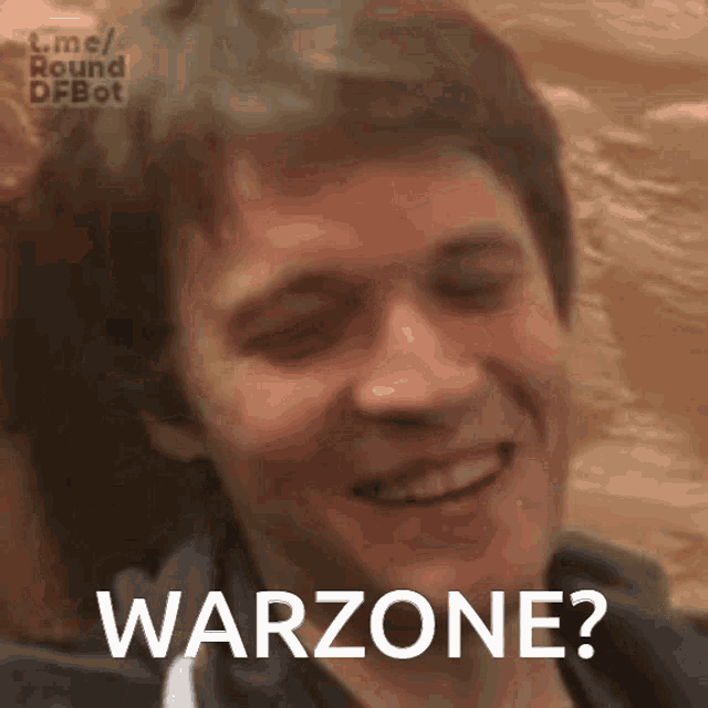 a close up of a man 's face with the word warzone on it