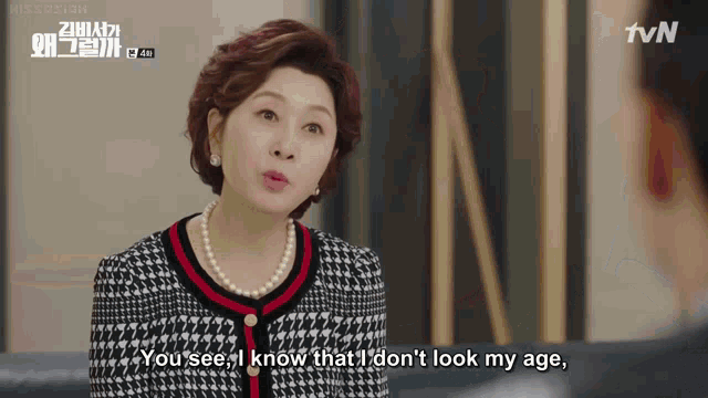 a woman in a pearl necklace says " you see i know that i don t look my age "