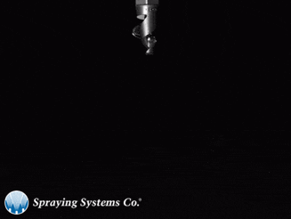 a black and white photo of a spraying system co