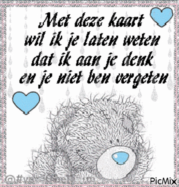 a teddy bear with a message in a foreign language on it