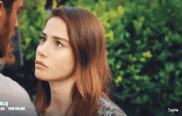 a close up of a woman 's face with the words sophie on the bottom right