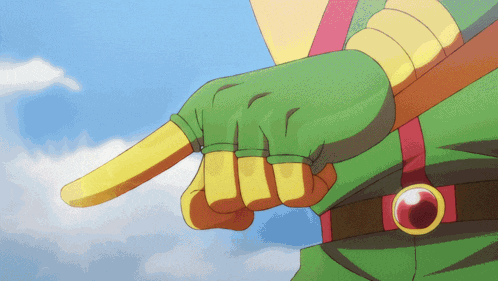 a person wearing a green and yellow glove is pointing with their finger