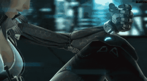 a woman in a futuristic suit holds a robot arm