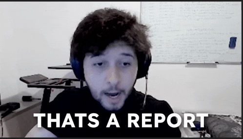 a man wearing headphones says that 's a report in front of a white board