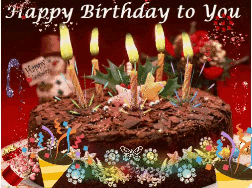a birthday cake with candles on it and the words happy birthday to you