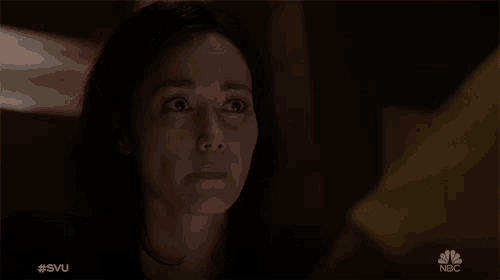 a close up of a woman 's face with the hashtag #svu on the bottom