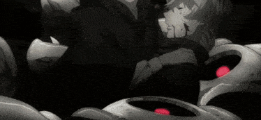 a man and a woman are hugging each other in a black and white anime scene .