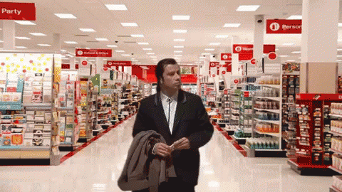 John Travolta In Retail GIF