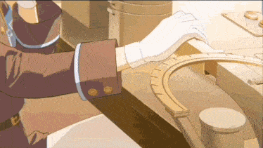 a person wearing white gloves is working on a piece of machinery