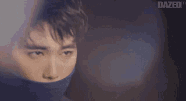 a close up of a person 's face with the words dazed tv behind him