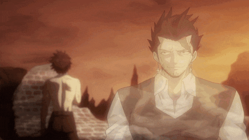 a man with a beard and earrings stands in front of another man without a shirt