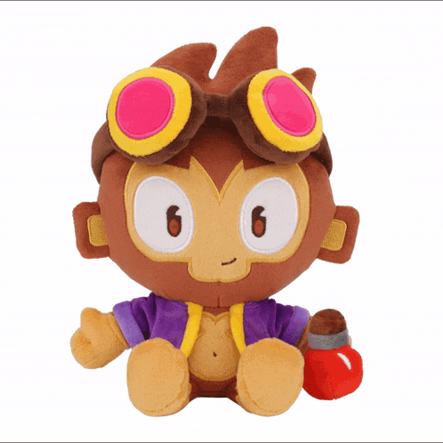 a stuffed monkey wearing goggles and a purple jacket with the number 6 on it