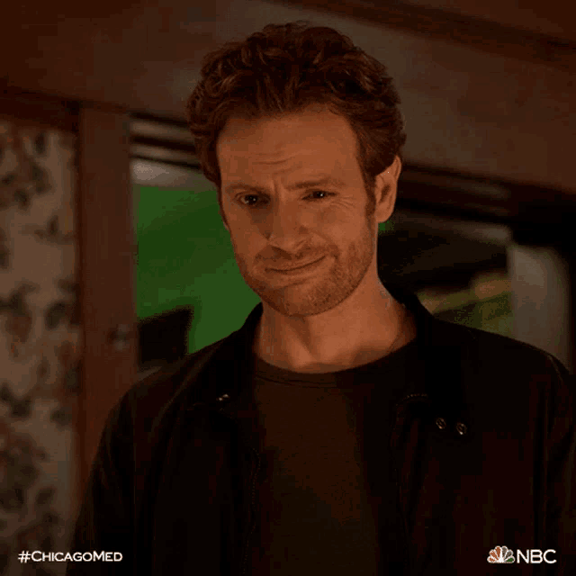 a close up of a man 's face with the hashtag #chicagomed on it