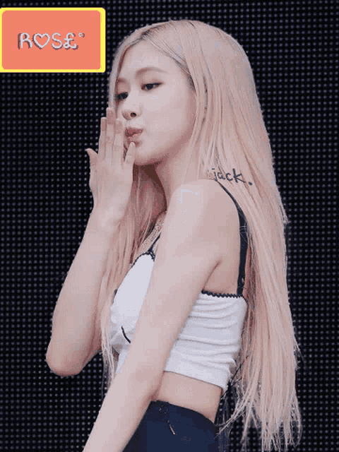 a woman with long blonde hair blowing a kiss with the word rose in the corner