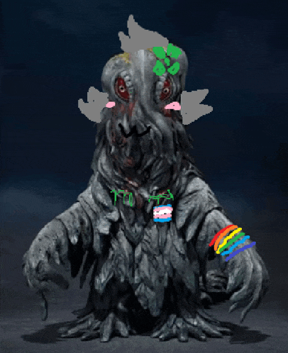 a statue of a monster with a rainbow bracelet around its wrist