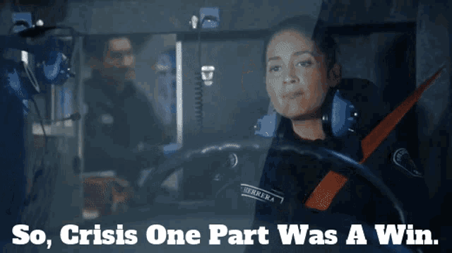 a woman behind a steering wheel with the words so crisis one part was a win above her