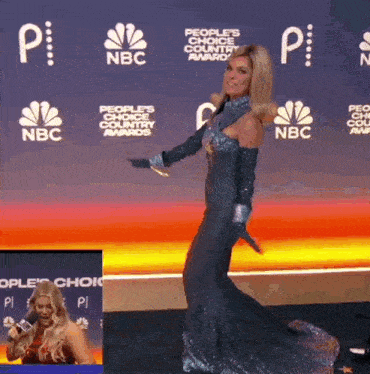 a woman is dancing on a red carpet at the people 's choice country awards .