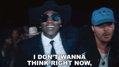 a man wearing a cowboy hat and sunglasses says i don 't wanna think right now