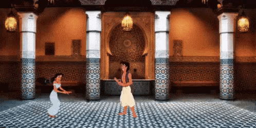 a man and a woman are dancing in a room surrounded by columns .