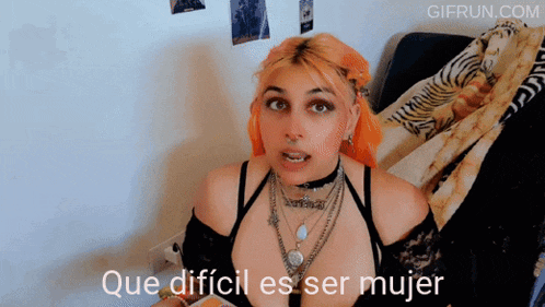 a woman says que dificil es ser mujer in a gif