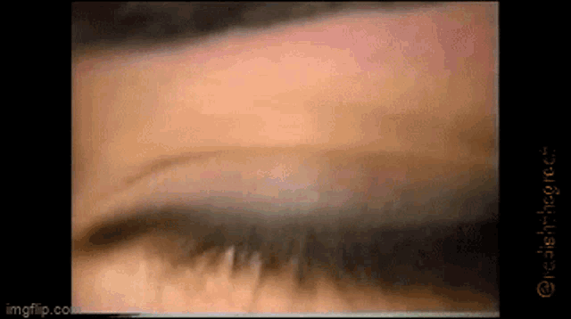 a close up of a woman 's eye with the words imgflip.com at the bottom of the screen