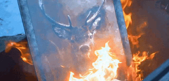 a painting of a deer is on fire