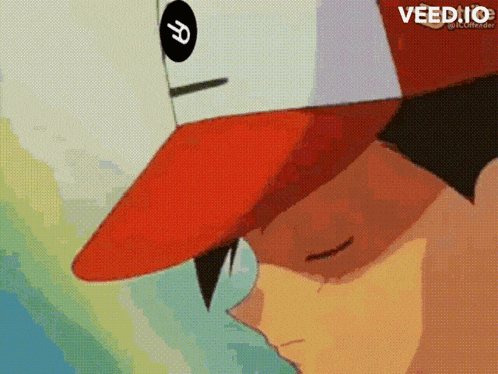 a close up of a person wearing a red and white hat with the letter r on the front