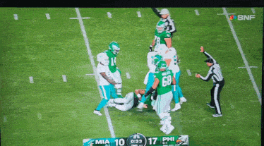 a football game between miami and philadelphia