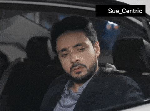 a woman standing next to a car with the name sue centric on the bottom
