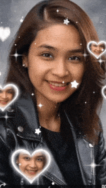 a woman in a black leather jacket is smiling with hearts around her face