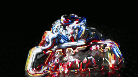 a blurry image of a red white and blue object in the dark