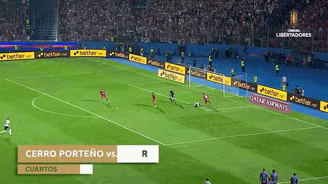 a soccer game is being played between cerro porteño and cuartos