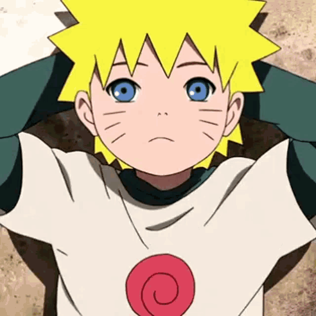 a young boy with yellow hair and blue eyes is wearing a white shirt with a red spiral on it .