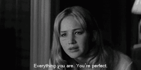 a black and white photo of a woman saying everything you are . you 're perfect .