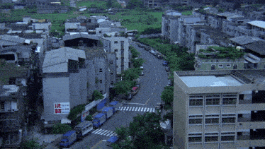 an aerial view of a city with a sign on the side of a building that says ' chinese ' on it