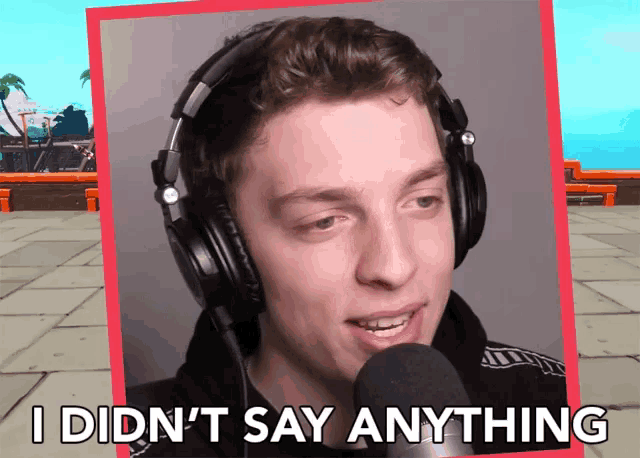 a man wearing headphones and a microphone says i didn 't say anything