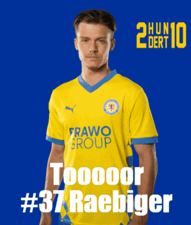 a man wearing a yellow shirt that says " toooor # 37 raebiger "