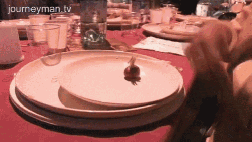 a journeyman.tv logo can be seen on a table