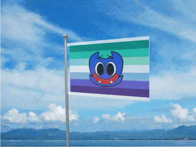 a flag with a cartoon face on it flying in the wind