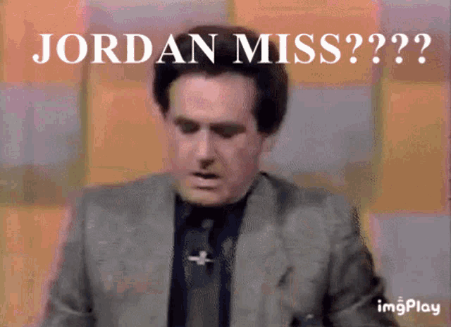 a man in a suit and tie says jordan miss on a screen