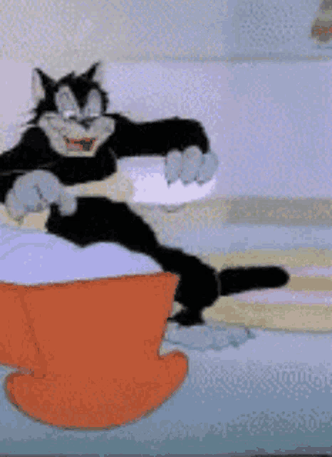 a cartoon cat is sitting on a bed holding a pillow .