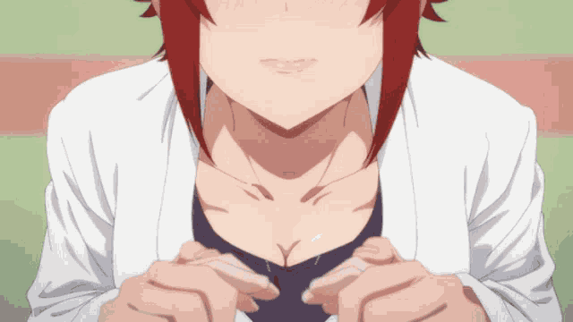a close up of a woman 's breast with her hands on it