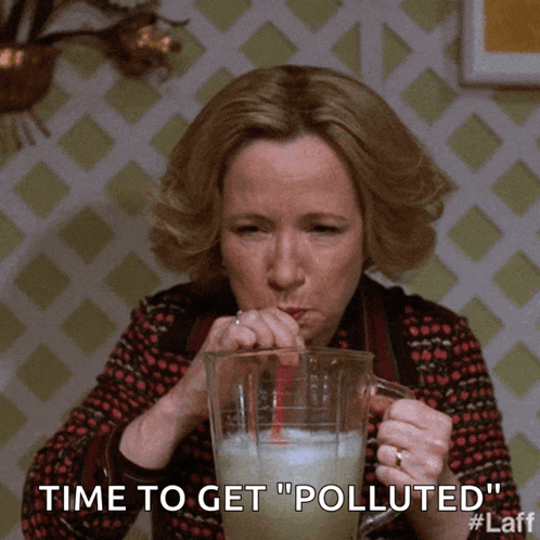a woman drinking through a straw with the words time to get " polluted " next to her