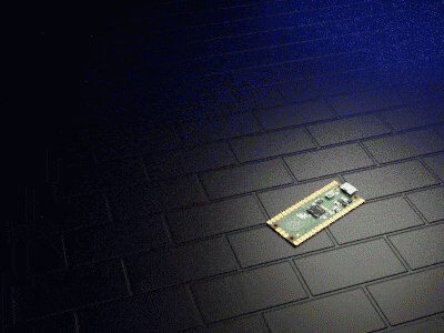a small electronic device is sitting on a black brick floor