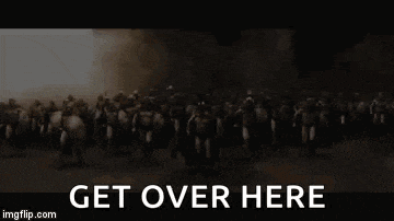 a large group of soldiers are walking in a dark room with the words get over here written on the bottom