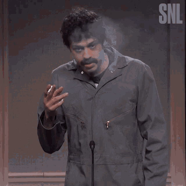 a man is smoking a cigarette and the word bad is above him