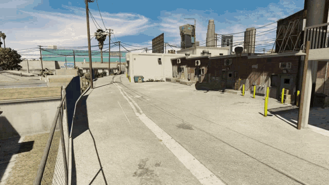 a video game scene shows a street with a fence and a building that says ' a ' on it